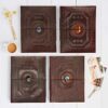 Four Indra Extra Large Embossed Leather Photo Albums with Semi-Precious Stone. Available in lapis, tiger's eye, labradorite and black onyx.