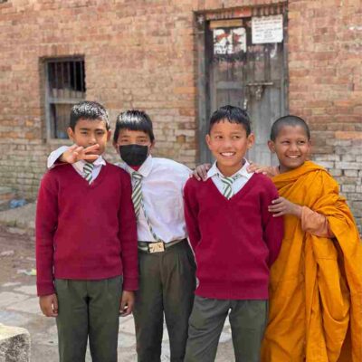 A group of monks pose for a photo during their trip to Nepal in Kathmandu.