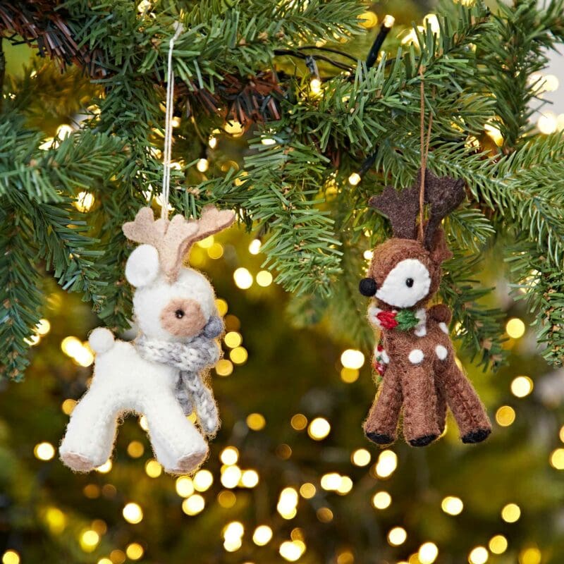 Two Felt Reindeer Christmas Decorations hanging from a tree.