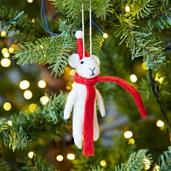 A small Felt Christmas Mouse Decoration is hanging from a tree.