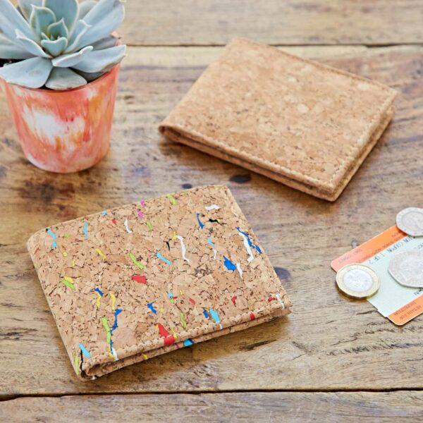 A Natural Cork Billfold Wallet with a plant and money next to it.