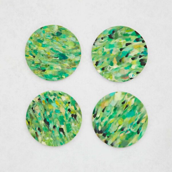 Set of 4 Recycled Round Plastic Coasters on a white surface.