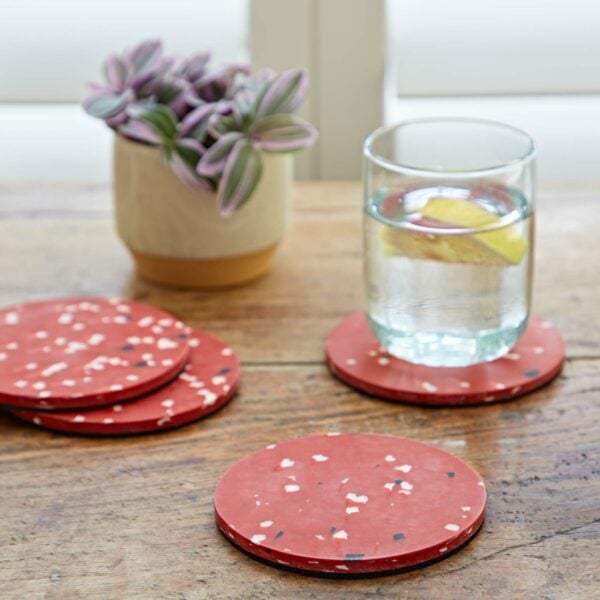 Set of 4 red polka dot coasters.