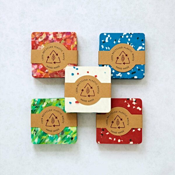 Set of 4 Recycled Plastic Square Coasters, made from recycled plastic with a label on them.