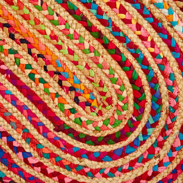 A Multicoloured Jute and Cotton Oval Rag Rug in a circular shape.