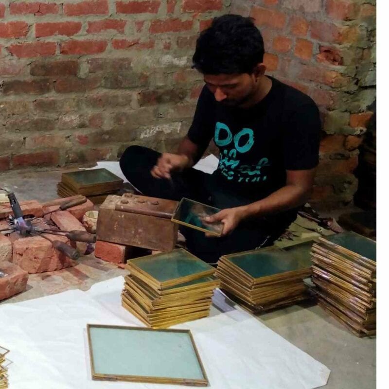 A man is working on a piece of wood as per a care guide.