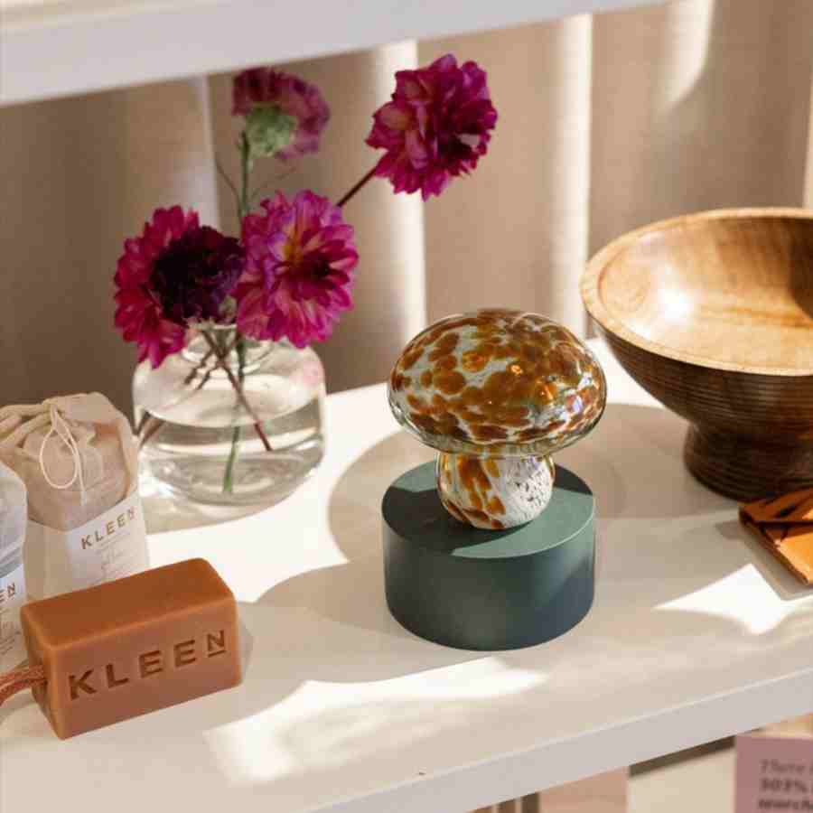 A white shelf with various items on it, suitable for press enquiries.