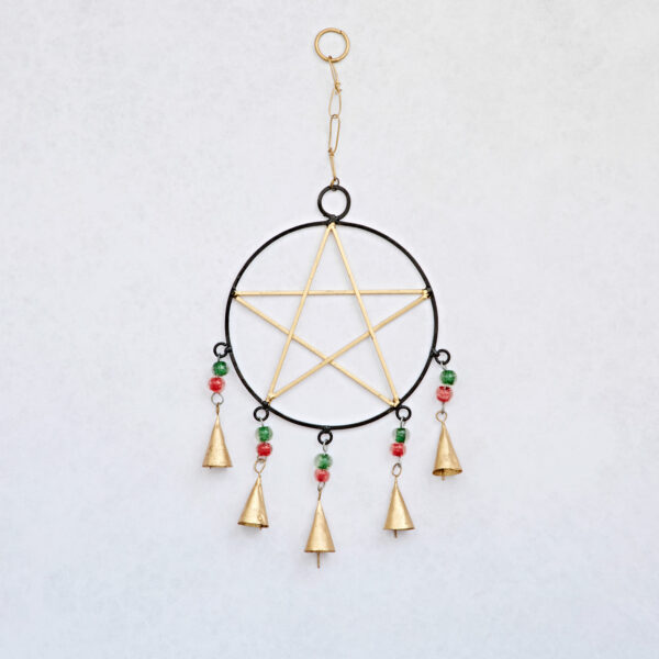 The Recycled Iron Star and Bells Wind Chime features a metal star crafted from recycled iron, five gold bells, and green and red beads, suspended by a chain. Perfect as a unique wall hanging or wind chime for your space.