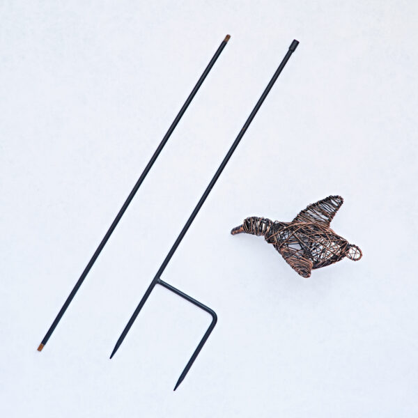 The Recycled Wire Duck Garden Stake Decoration features three metal objects on a light surface: two straight rods, a bent rod with a forked end, and a duck sculpture—ideal as a whimsical addition to your garden.