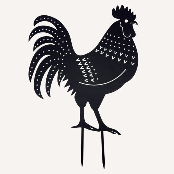The Recycled Metal Cockerel Silhouette Garden Stake features a black rooster design with decorative cutout patterns and two prongs for easy display in your garden.