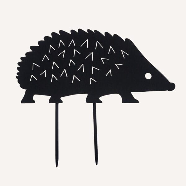 The Recycled Metal Hedgehog Silhouette Garden Stake, made from black recycled metal with two stakes for outdoor use, is shown against a plain light background.
